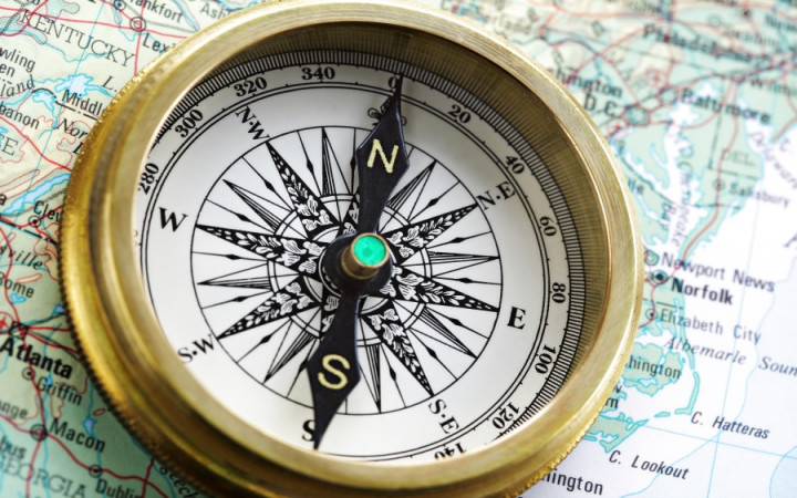 Why does a compass deals always point north